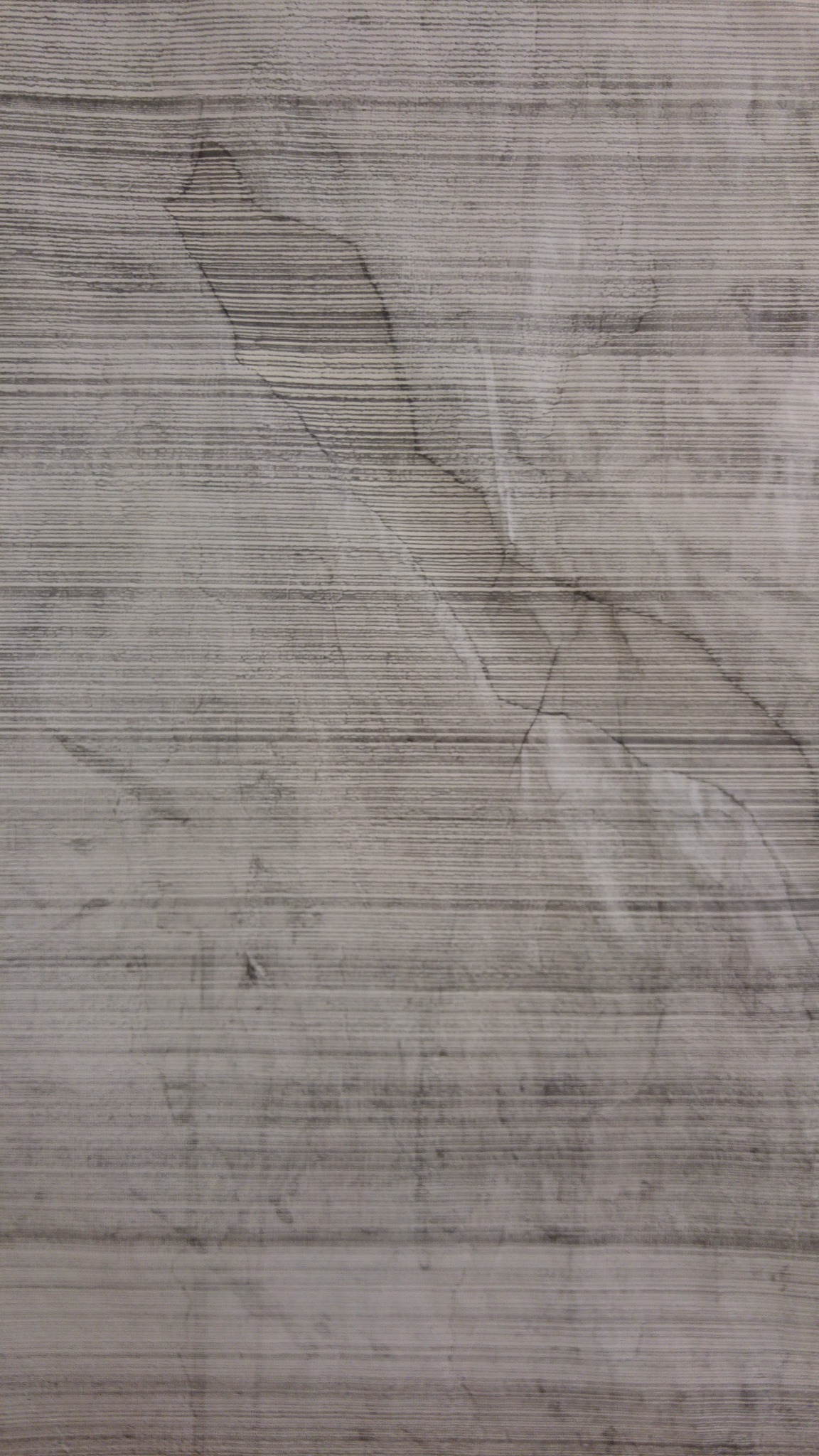 Close view of graphite lines and paper seams in Literary Frottage