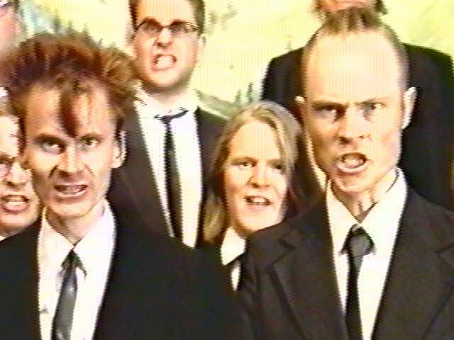 Close view of shouting choir members